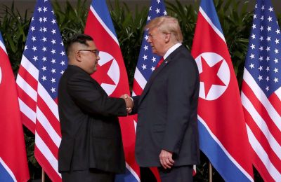 Trump and Kim shake hands in Singapore
