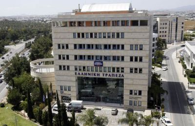 Hellenic Bank got 400,000 new customers on Monday following the formal acquisition of parts of state-owned CCB