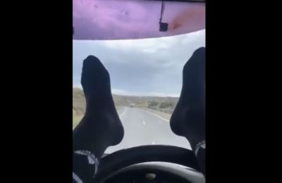 Man admits charges after posting video of his highway driving skills with both feet and no hands