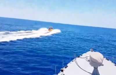Police video shows Greek Cypriot coast guard vessel pursuing refugee boat carrying 35 people