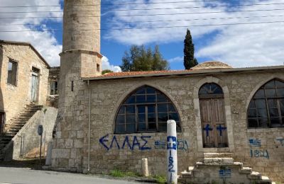 Vandals spray paint mosque with graffiti