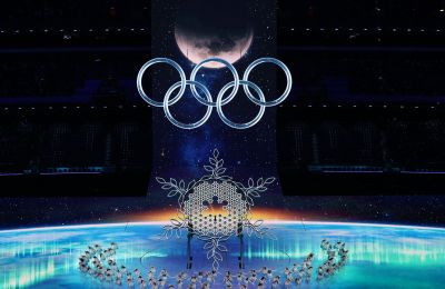 With rings breaking from block of ice, Olympic Games ceremony begins