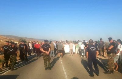 Local leaders arrested in asphalt plant demo