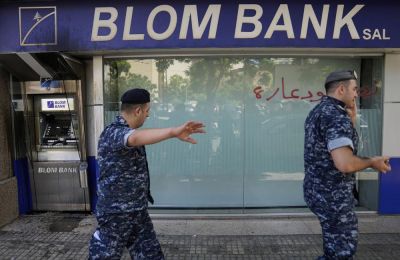 Woman forcibly takes savings from Beirut bank using toy gun (video)