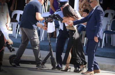 Police tackle Chinese woman at military parade