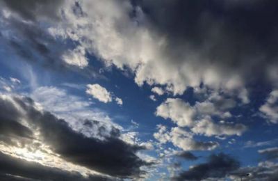 Partly cloudy skies with frost in the mountains