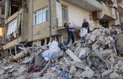 File photo of Turkish residents collecting personal items from their damaged home after the February 2023 earthquake that struck Turkey and Syria