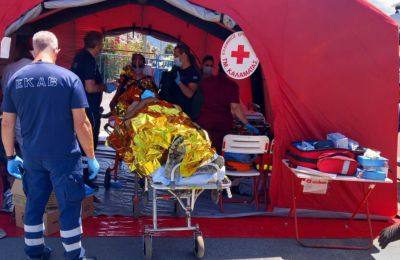 More than 100 rescued after fishing vessel capsizes and sinks off southern coast of Greece, dozens dead