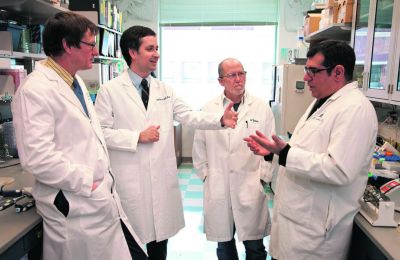 Nickolaos Papadopoulos (right) with his colleagues at Johns Hopkins University. 