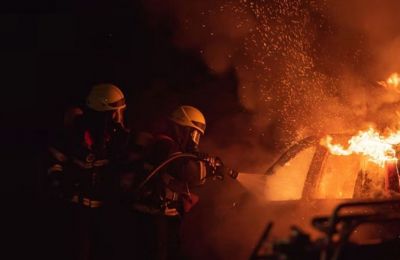 Block of flats shrouded in mystery after vehicle fire