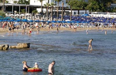 Cypriots flock to the coast for summer holidays despite rising prices