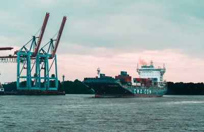 Photo of container ship in a Dutch harbor - Unsplash