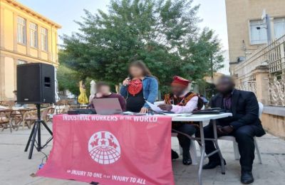 A gathering of African workers and organizers in Nicosia's Old Town, sharing stories, music, and solidarity at Cyprus's first African Workers' Conference. Credit: IWW-CyROC