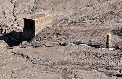 Photo of a drained Mavrokolympos Dam