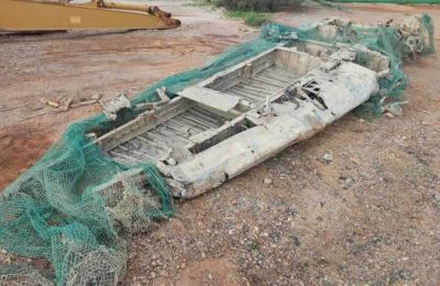 Cretan fisherman nets World War II bomber wing