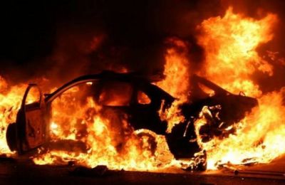 A car is completely engulfed in flames. file photo