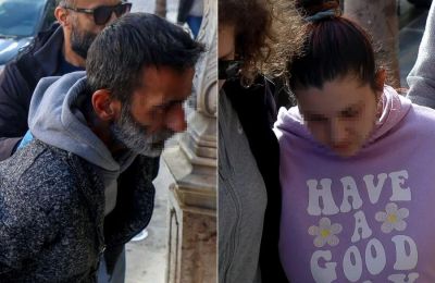 The 26-year-old mother and her 44-year-old partner arrive at the Heraklion courthouse amid heavy police presence. Photo credit: Protothema.gr