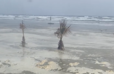 Waves surge beyond the shoreline in Mackenzie, flooding the beachfront and reaching nearby restaurants. Photo and videos courtesy of: Theodora Pittakou Kyriakidou Facebook