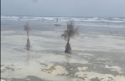 Waves surge beyond the shoreline in Mackenzie, flooding the beachfront and reaching nearby restaurants. Photo and videos courtesy of: Theodora Pittakou Kyriakidou Facebook