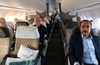 Photo taken of the delegation to Geneva, travelling yesterday with Nikos Christodoulides, Nicos Anastasiades in the background, and other political dignitaries seen here.