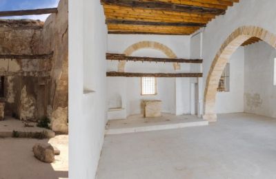 Before and after photos of Panagia Chrysopolitissa during its restoration.
