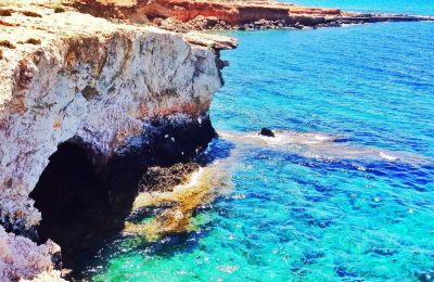 Joint effort by fire and ambulance services brings woman to safety from rocky coastal area. File photo