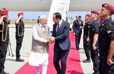 PIO photo of India's PM Modi arriving at Larnaca airport on June 15, 2025, greeted by President Christodoulides.