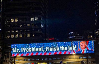 A billboard in Tel Aviv asking US President Donald Trump to 'Finish the job'. Photo courtesy Anadolu via Getty images