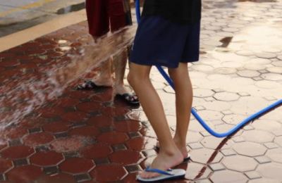 New law expands ban on non-essential hose use, increases fines for violations. Photo credit: Unsplash