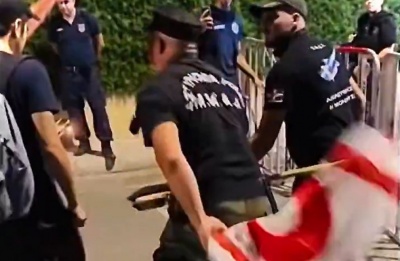 Police step In as students attempt to burn flag at checkpoint. Photo screen captured from Kypros Patrida Mou Facebook video
