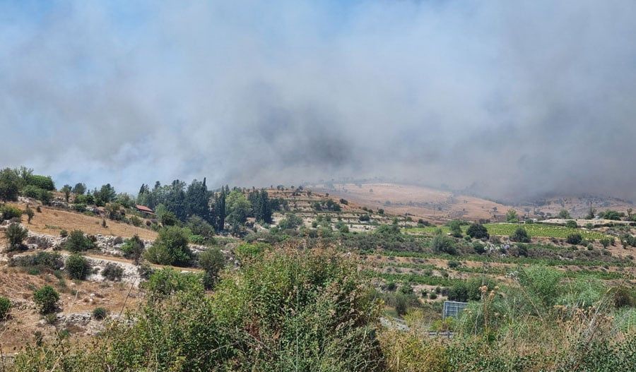 Fires close in on homes as heat fuels twin blazes in Cyprus