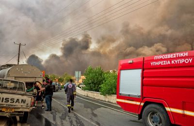 Two bodies discovered in burned vehicle as hundreds flee homes; firefighting efforts continue amid extreme heat and high winds