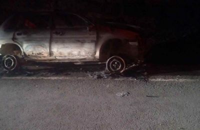 Officials say bodies found in burned car were unrecognizable; DNA testing underway. Photo courtesy of Kanali 6 via 24news.