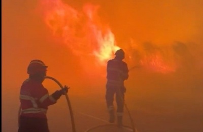 Spain battles worst wildfires in decades; Political blame game flares. Photo screen captured from Anadolu Agency via Real Time News Facebook viedo
