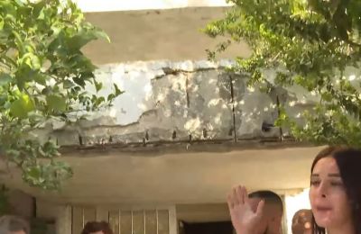 Families face daily danger in aging refugee housing. Photo screen captured from @alphanewslive YouTube