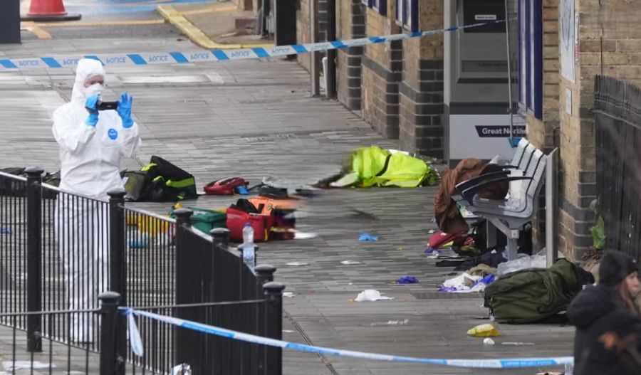 Early evidence points to an “isolated attack” as emergency crews treat victims and major rail disruptions continue through the weekend. Photo screen captured from The Guardian video