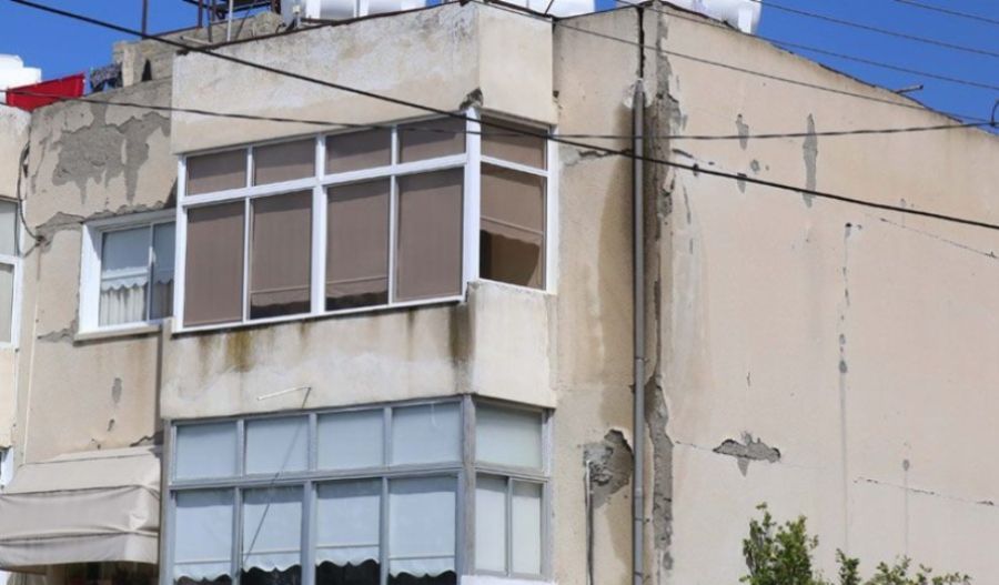 Elderly refugee residents lifted by forklifts to enter and exit their flats