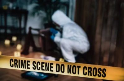 Police investigate scene as community awaits details on suspect and motive. File photo