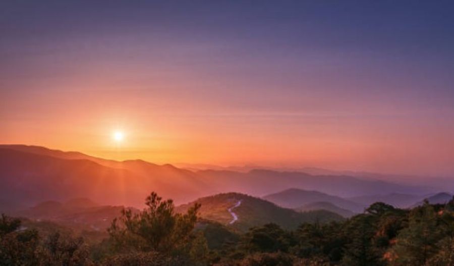 High pressure keeps the weather composed while light dust drifts through like unfinished housekeeping.