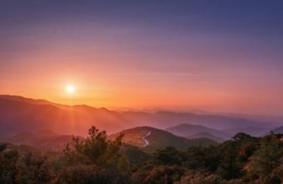 High pressure keeps the weather composed while light dust drifts through like unfinished housekeeping.