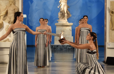 Winter Olympics flame lit in Olympia, begins its journey to Italy