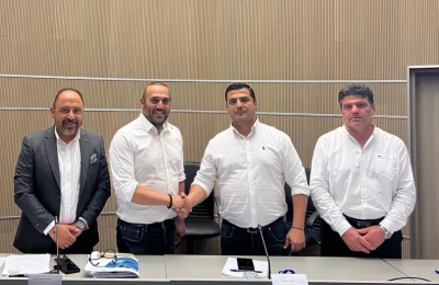 Photo by Famagusta News shows Yiannis Karoousos and VP of EOA Famagusta Chrysostomos Flourentzou