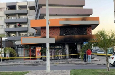 Owner previously targeted in car arson; police boost protection.