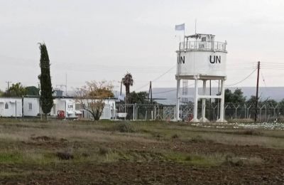 Incident occurred beside a UN outpost and was halted by heavy rain; matter reported to the United Nations and Cyprus Foreign Ministry