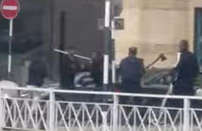 Axes and gunshots in broad daylight next to Police HQ?