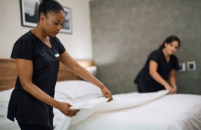 Weak oversight and steep payroll deductions leave many migrant workers underpaid while raising risks for key sectors such as tourism. Photo credit: Unsplash