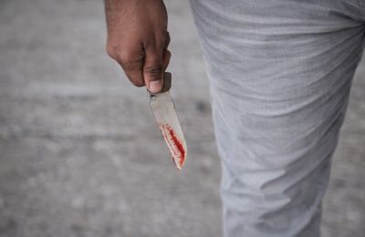 Dispute over work issues escalated into knife attack causing serious injury. Image is AI