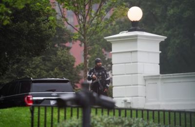 Authorities investigate incident near Pennsylvania Avenue as armed personnel secure the area