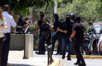 File photo of alleged Hamas suspect being arrested in Greece