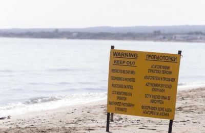 Beachgoers advised to use sunscreen, rinse with clean water after swimming and seek treatment if symptoms become severe. File photo